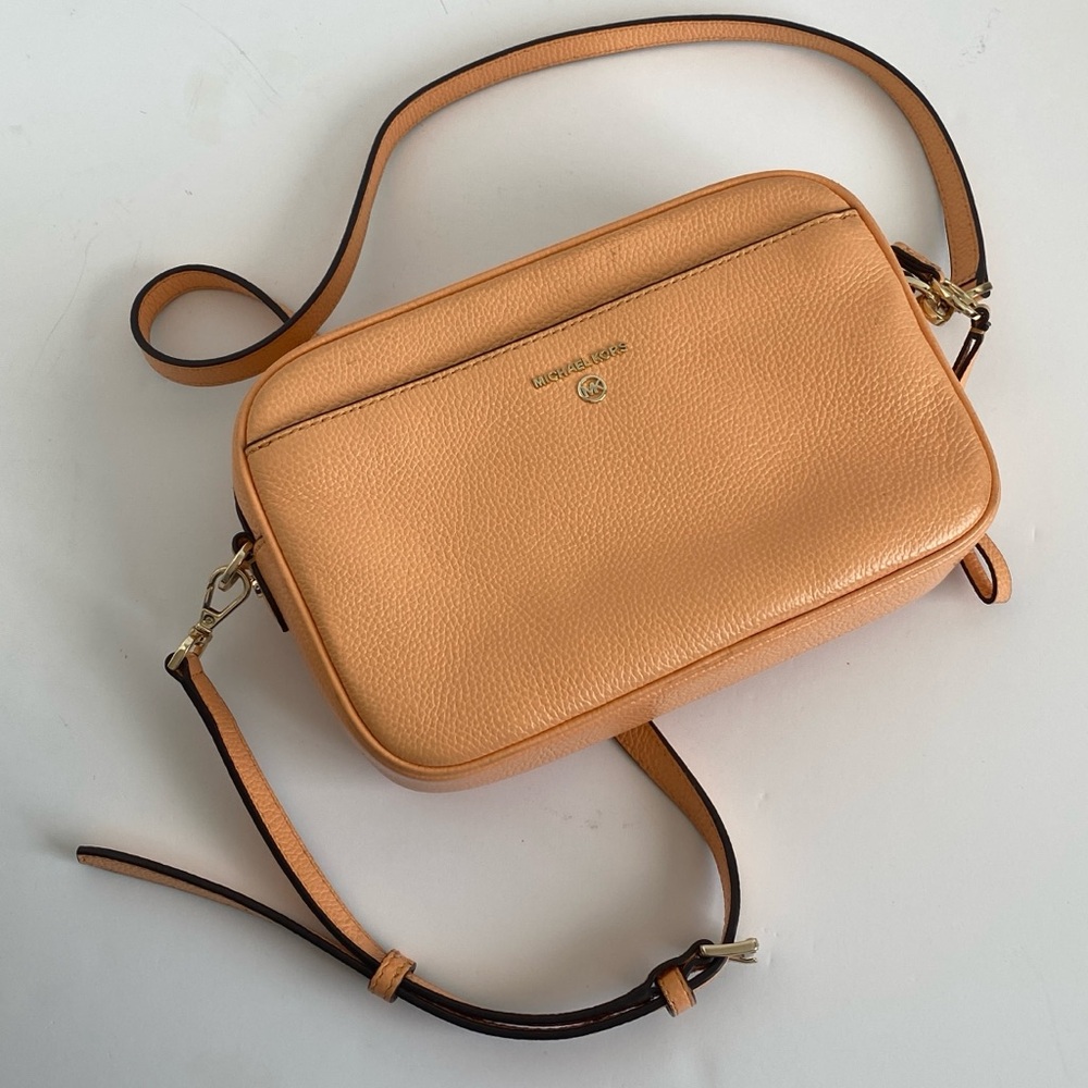 Peach Crossbody Bag with Zipper Closure and Adjustable Strap